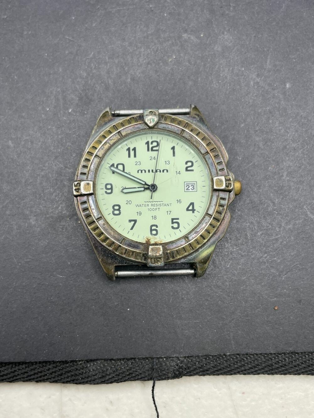 Vintage Milan Quartz Watch Men's Bronze Tone Fixed Bezel MLN810 37MM 100ft